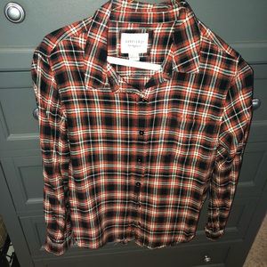 Red, Black, and white long sleeved button up